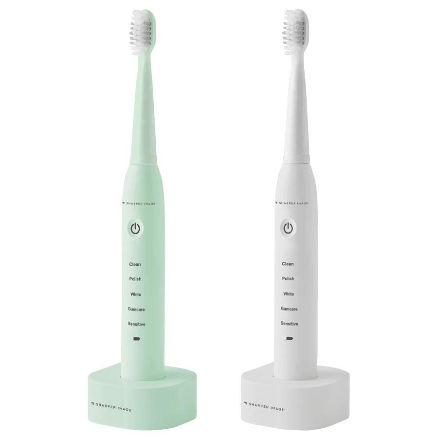 The Sharper Image Electric Toothbrushes are shown in mint green and white, each with a charging base. They feature modes for Clean, Polish, White, Gumcare, and Sensitive, with a power button in the center.