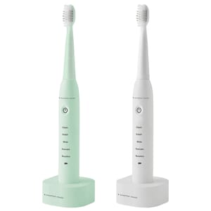 The Sharper Image Electric Toothbrushes are shown in mint green and white, each with a charging base. They feature modes for Clean, Polish, White, Gumcare, and Sensitive, with a power button in the center.