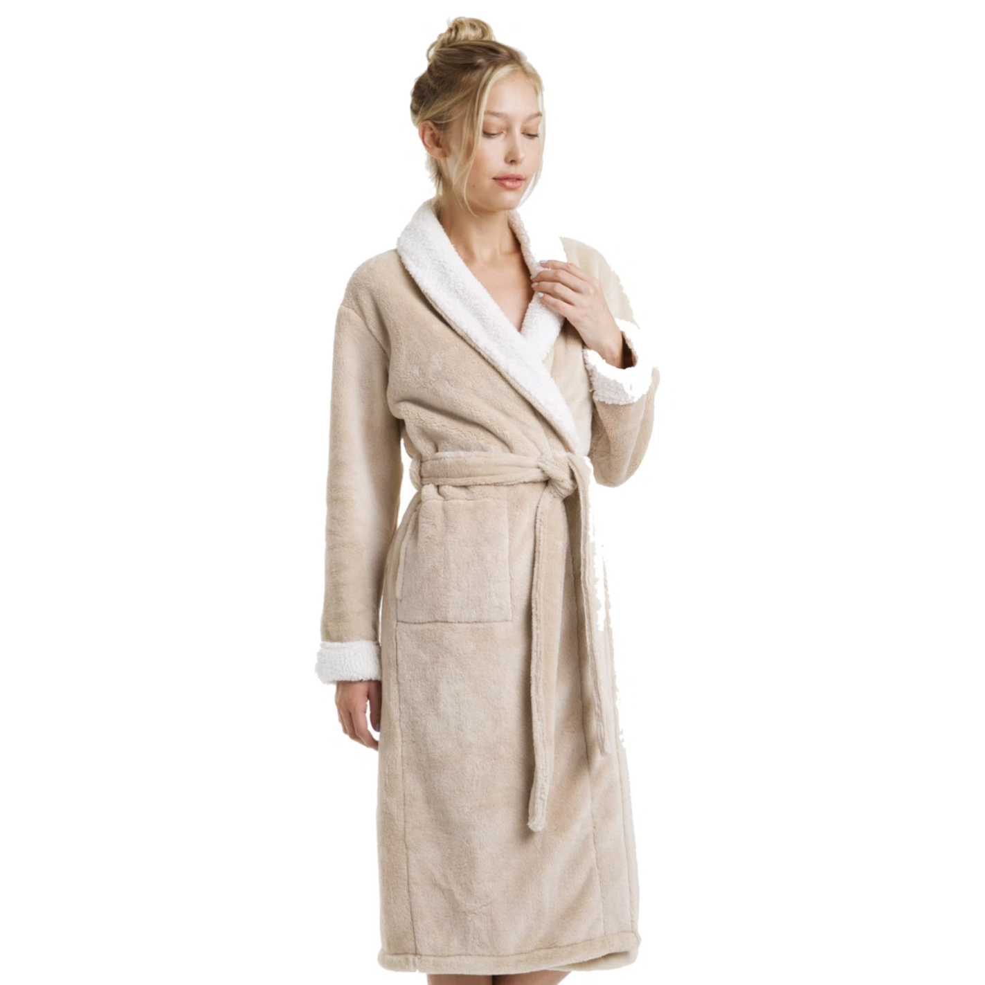 A woman is modeling a beige fleece bathrobe with white sherpa trim, featuring a tie belt and pockets.