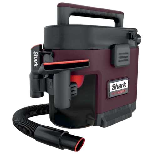 A compact maroon and black Shark vacuum cleaner with a handle, hose, and attachment for cleaning.