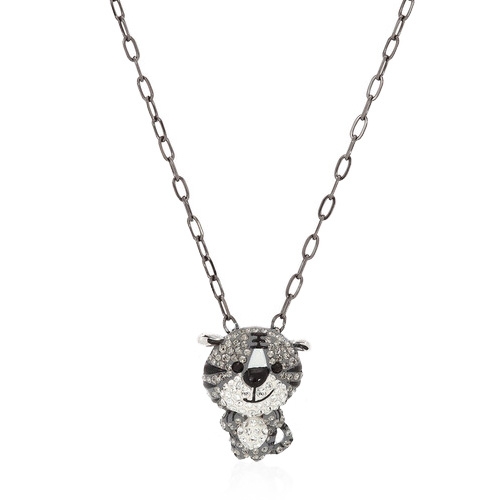 A necklace featuring a chain with a pendant shaped like a stylized bear face, adorned with sparkling stones.