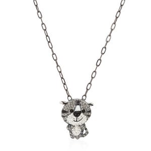 A necklace featuring a chain with a pendant shaped like a stylized bear face, adorned with sparkling stones.
