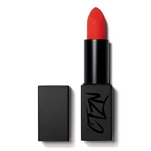 A bold red lipstick in a sleek black case with the brand logo \“Ctzn\“ in stylized writing on the base.