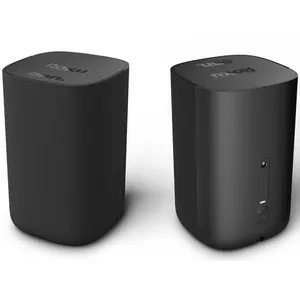 Two black wireless Roku speakers are shown, with one facing forward and the other showing the back, which features control buttons and connection ports.