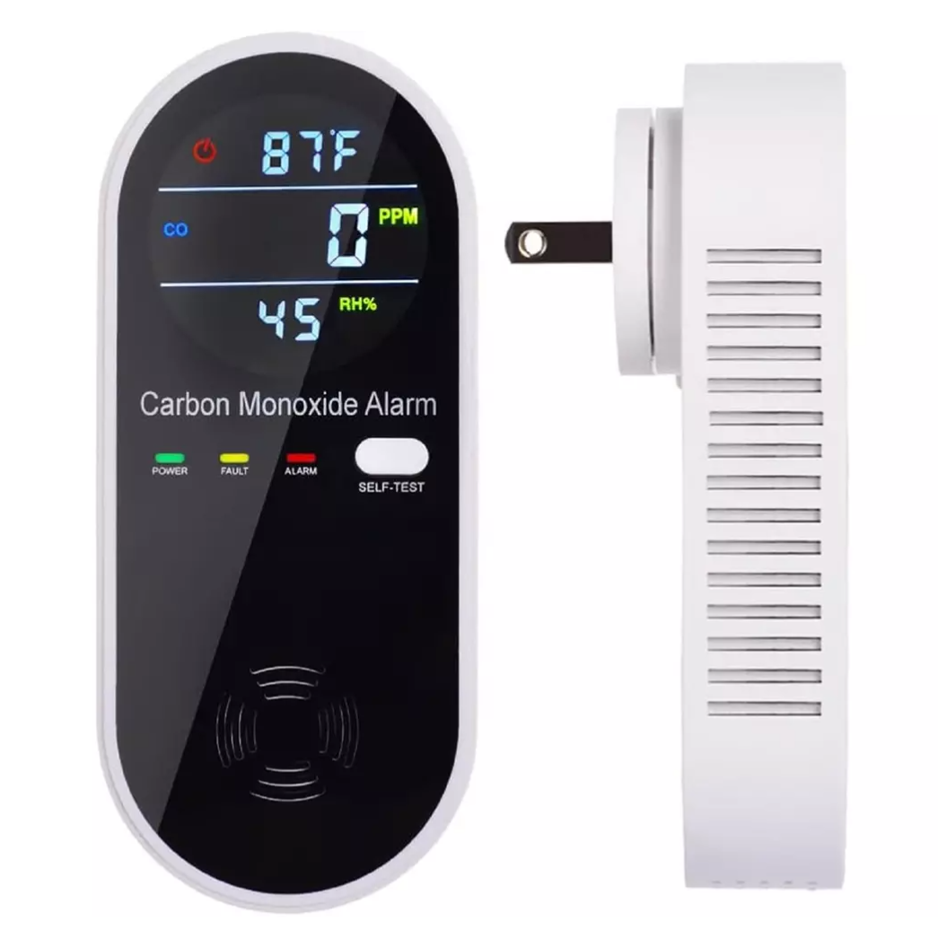 A digital carbon monoxide alarm with temperature and humidity display, featuring power, fault, and alarm indicators, as well as a self-test button. It's designed for wall plug-in installation.