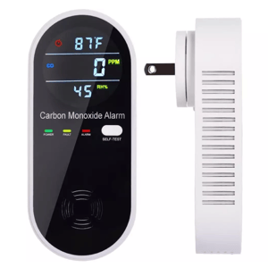 A digital carbon monoxide alarm with temperature and humidity display, featuring power, fault, and alarm indicators, as well as a self-test button. It's designed for wall plug-in installation.