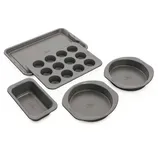 Five-piece bakeware set including two round cake pans, a muffin tray, a loaf pan, and a cookie sheet.