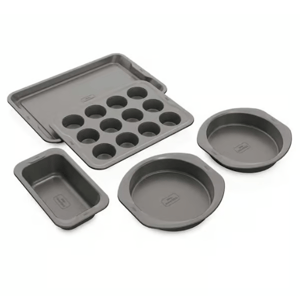 Five-piece bakeware set including two round cake pans, a muffin tray, a loaf pan, and a cookie sheet.