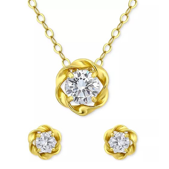 A gold necklace and earring set featuring intertwined loops with round clear gemstones at the center of each piece.