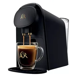 A black L'OR Barista coffee machine is shown with a glass mug filled with coffee, featuring the L'OR logo on both the machine and mug.