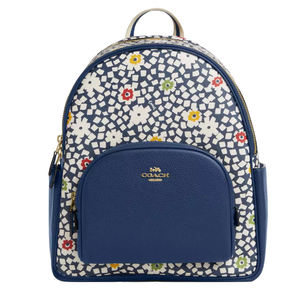 Coach floral-patterned backpack with blue leather accents and front pocket, featuring a gold logo.