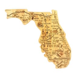 A wooden cutting board shaped like the state of Florida features illustrations of cities, landmarks, and symbols such as oranges, palm trees, and the sun.