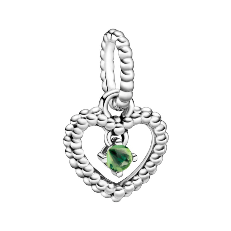 A heart-shaped charm with a beaded design and a dangling green gemstone at the center.