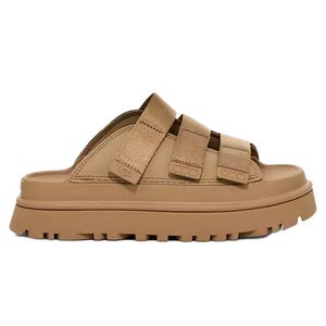 Tan leather slide sandal with three adjustable straps and a chunky, rugged sole.
