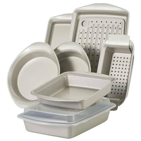 Bakeware set including round, square, and rectangular pans, a pizza pan, and a perforated crisper, all with nonstick surfaces.