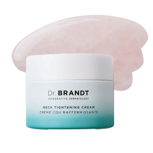 Dr. Brandt Integrative Dermatology Neck Tightening Cream, shown with a pink gua sha stone, is designed for skin firming and tightening.