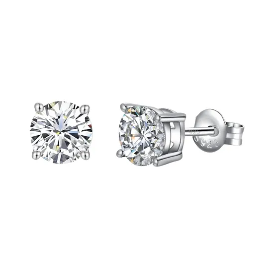 A pair of round-cut silver stud earrings with clear gemstones, set in four prong settings and featuring a 925 sterling silver marking on the back.