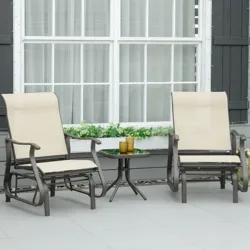 Two beige outdoor glider chairs with armrests are positioned around a small round black glass table, set on a gray patio in front of a window with a flower box.