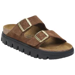 Brown suede sandal with two adjustable gold buckles and a black textured rubber sole.