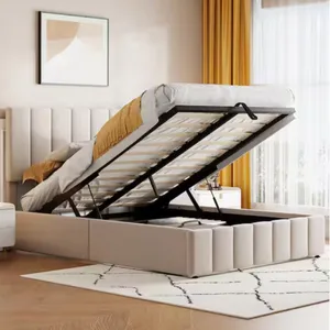 A beige upholstered bed with a lift-up storage compartment, featuring a mattress partially raised to reveal ample space underneath. The room includes yellow accents, a patterned rug, and a framed abstract artwork.