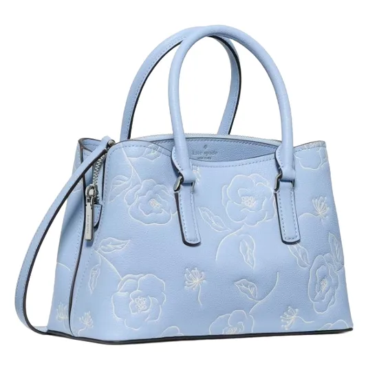 Light blue handbag with floral embroidery, featuring dual handles, a detachable shoulder strap, and a zippered top closure.