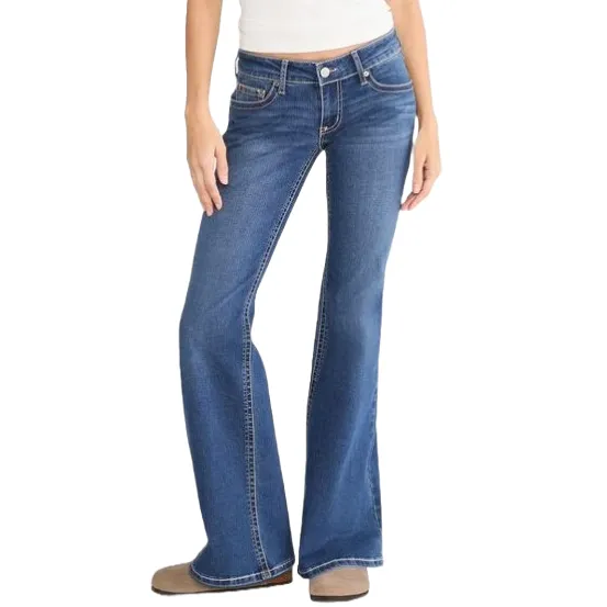 Blue flared jeans with front pockets and a button closure, paired with beige boots.