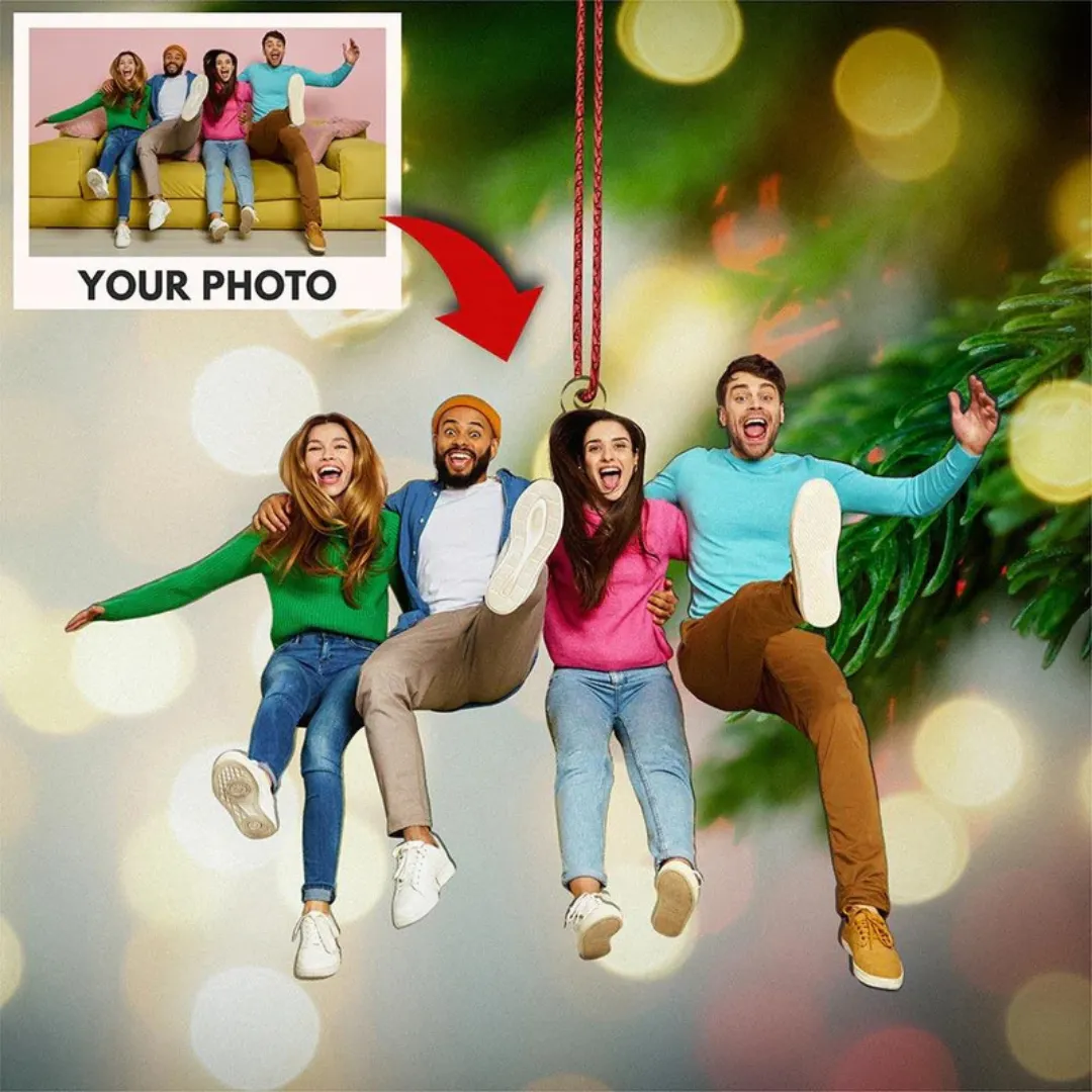 A customizable ornament photo decoration featuring four people posing joyfully as if they're hanging from a tree. The inset shows how a personal photo can be used in the ornament design.