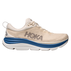 Hoka running shoe in beige with a blue and white cushioned sole. Features include a breathable upper, lace-up closure, and a loop at the heel.
