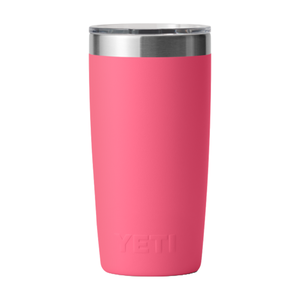Pink insulated tumbler with a stainless steel rim and clear lid, featuring the brand name \“YETI\“ embossed near the base.