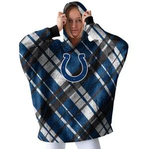 A person wears a plaid hooded blanket with a blue horseshoe logo, likely from a sports team, featuring colors of blue, white, and black.
