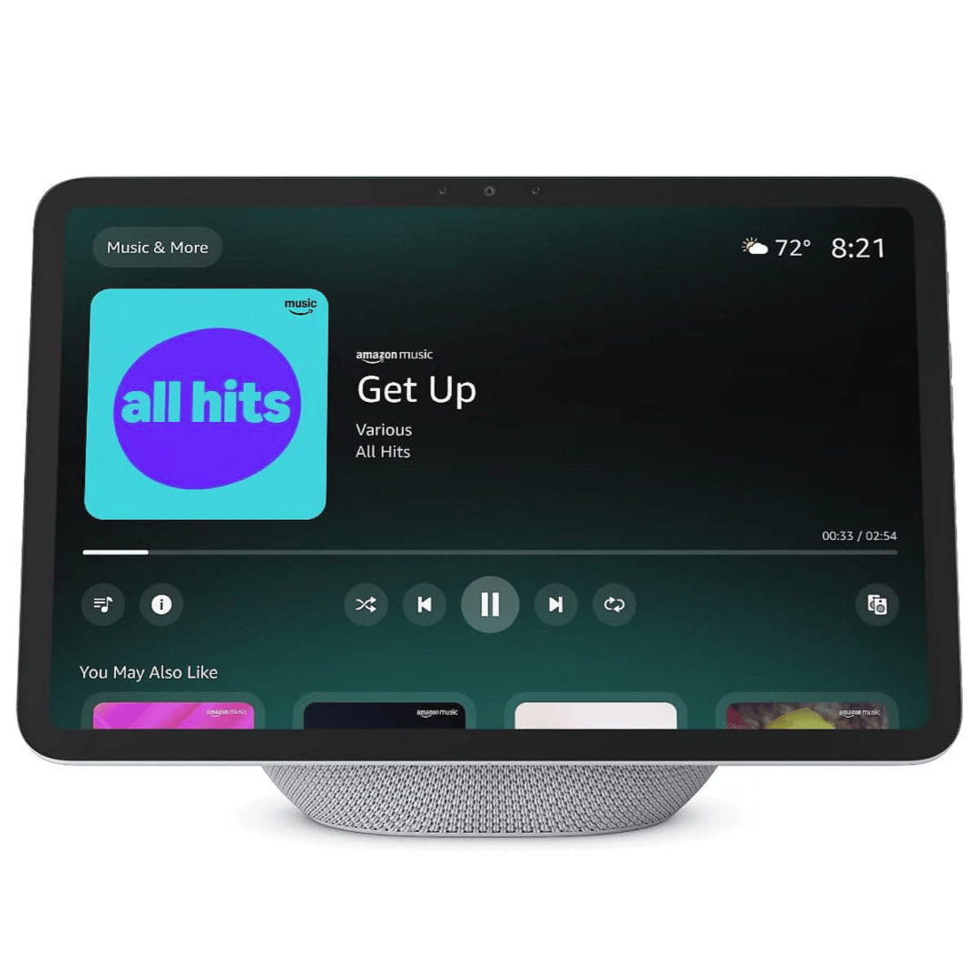 A smart display with a music interface showing \“Get Up\“ from \“All Hits\“ on Amazon Music, featuring controls for playback and recommendations. The time is 8:21, and the temperature is 72°F.