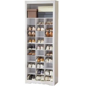 White shoe organizer with various footwear and storage boxes.