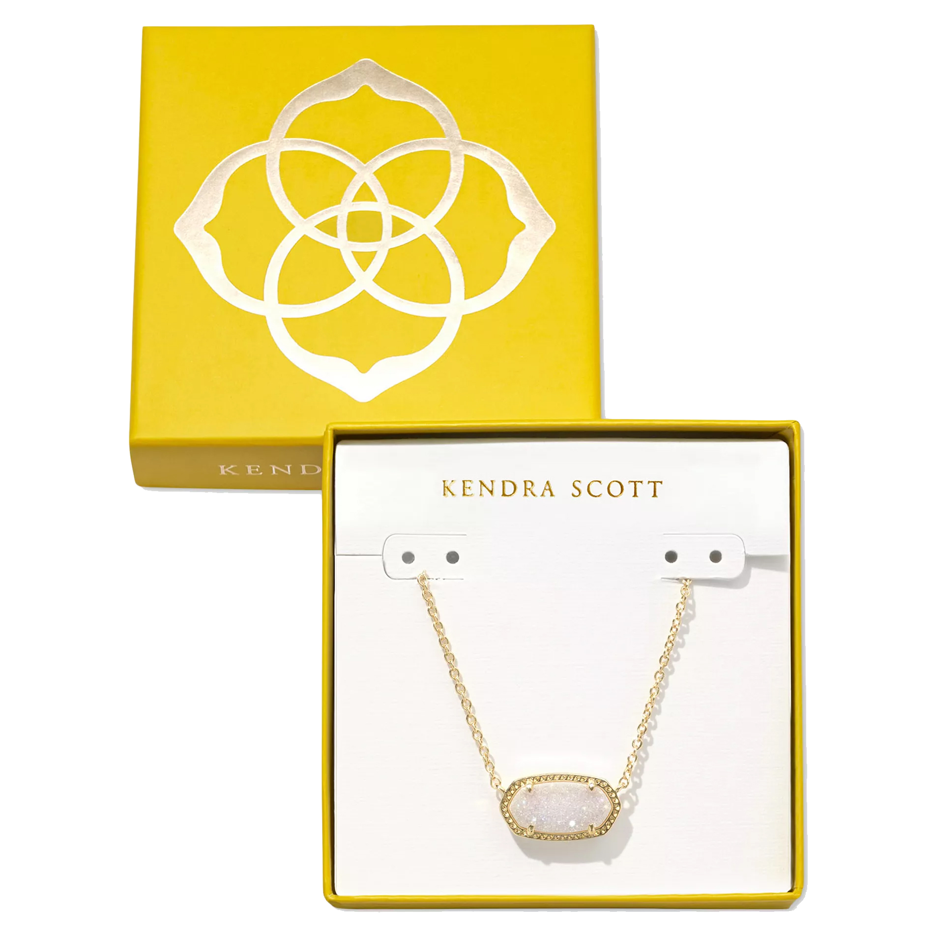 A Kendra Scott necklace with a gold chain and oval pendant is displayed in a yellow box featuring the brand's logo.