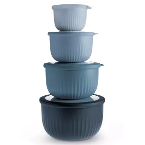 Four nested, round, textured containers in varying shades of blue, each with a matching lid, stacked vertically.