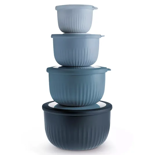 Four nested, round, textured containers in varying shades of blue, each with a matching lid, stacked vertically.