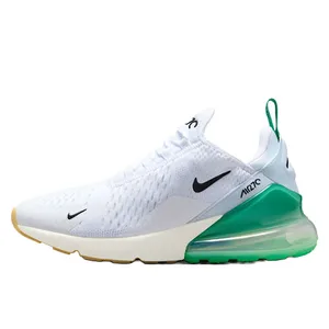 A white athletic shoe featuring a green translucent air cushion in the heel, a black swoosh logo, and a green heel tab for easy wear.