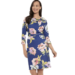 Blue sheath dress with a floral pattern featuring pink, white, and yellow flowers. It has 3/4-length sleeves and a modest neckline.