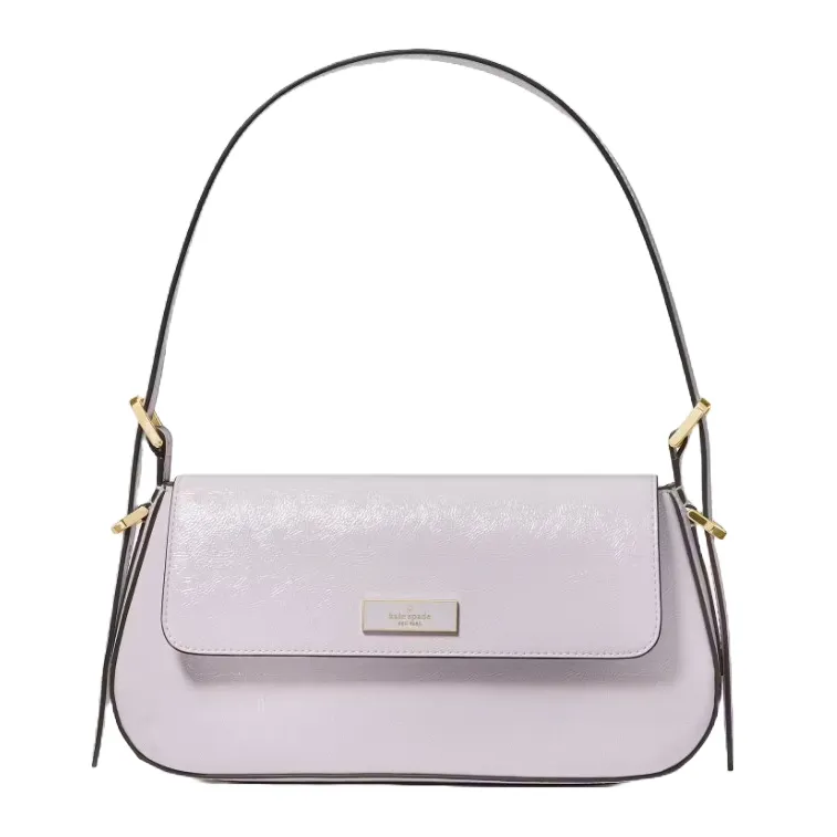 A light purple shoulder bag with gold hardware accents and a curved design. The bag features a flap closure and a structured handle.