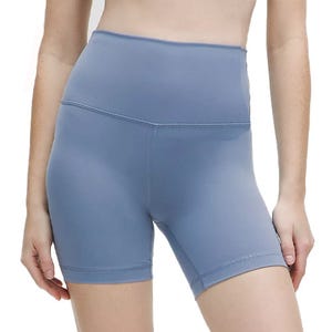 High-waisted blue athletic shorts made of stretchy fabric, reaching mid-thigh length.