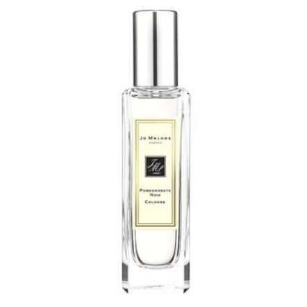 Jo Malone Pomegranate Noir Cologne features a clear, rectangular bottle with a silver cap, containing a rich, dark fragrance known for its notes of pomegranate, raspberry, and plum mixed with pink pepper and spicy woods.