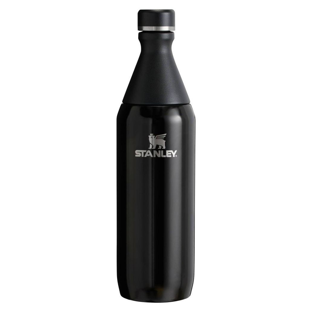 A black Stanley stainless steel water bottle with a tapered, detachable top and logo in the center.