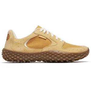 A beige Merrell sneaker featuring a rugged gum sole with textured treads, designed for outdoor activities.