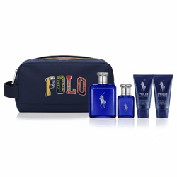 A navy toiletry bag with \“POLO\“ in colorful letters is accompanied by two blue Polo Ralph Lauren cologne bottles and two tubes of face or shave products.