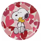 Round plate featuring a cartoon dog hugging a small yellow bird, set against a background of overlapping red and pink hearts.