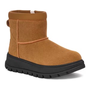 Koolaburra by UGG Mini Hybrid Boots feature a tan suede upper with a plush interior, a black lug sole for traction, and contrasting stitching.