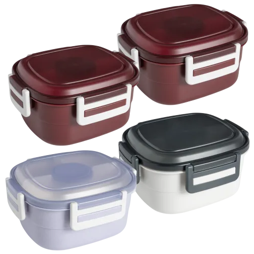 Four square lunch boxes in different colors—two burgundy, one purple with a translucent lid, and one black and white—each with white side latches.