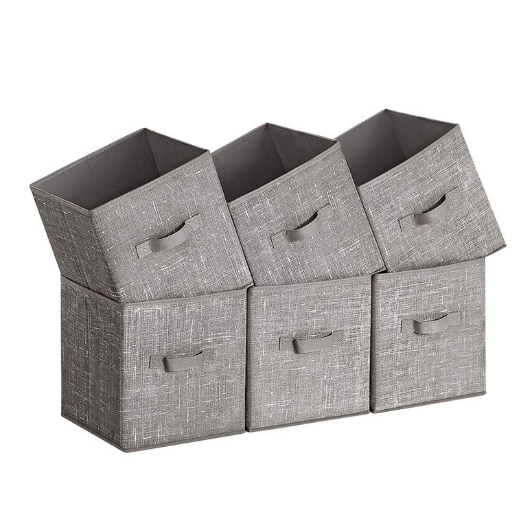 Six gray, fabric storage cubes with a textured pattern, each featuring a front handle. The top row is tilted slightly forward, creating a staggered effect.