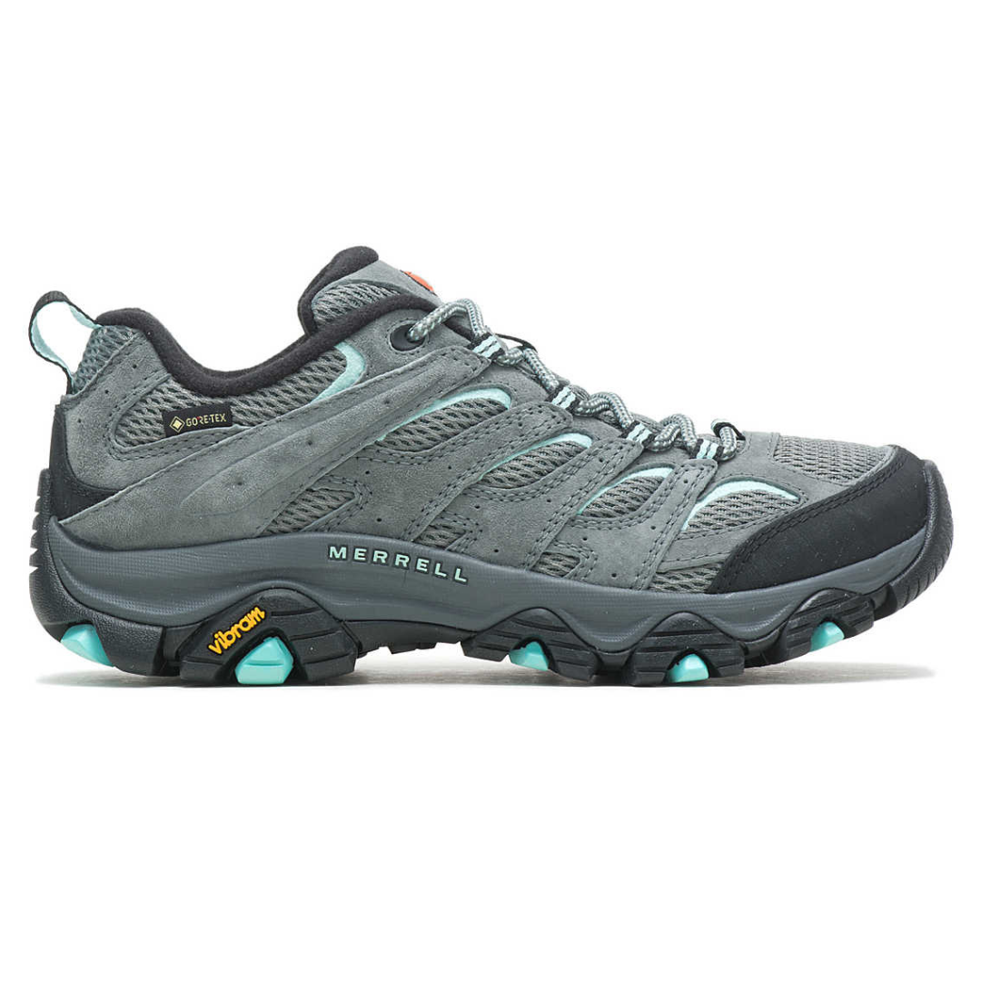 Merrell hiking shoe with GORE-TEX lining, featuring Vibram sole for traction, grey mesh and suede upper, and turquoise accents.