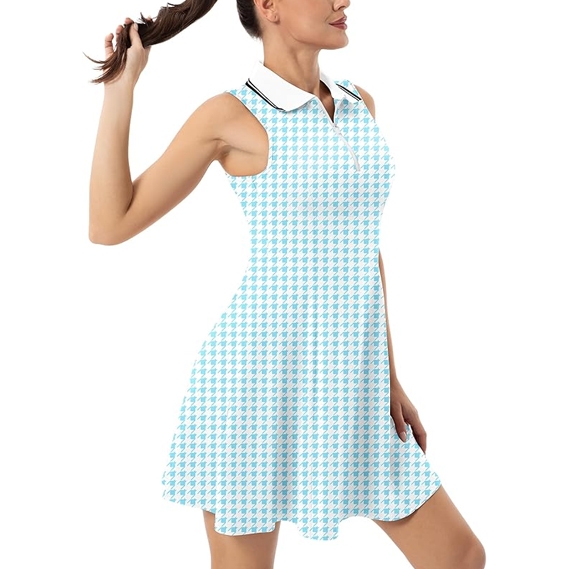 Sleeveless light blue and white houndstooth patterned V-neck golf dress with a white collar and a flared skirt, worn by a woman holding her ponytail.
