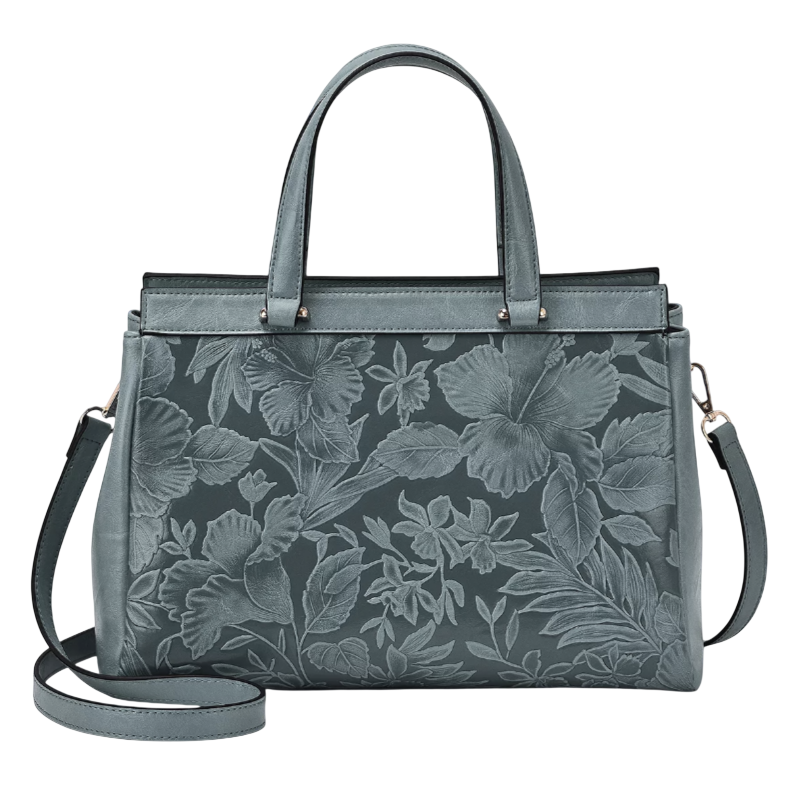 A teal handbag with floral embossing, featuring dual handles and an adjustable shoulder strap.